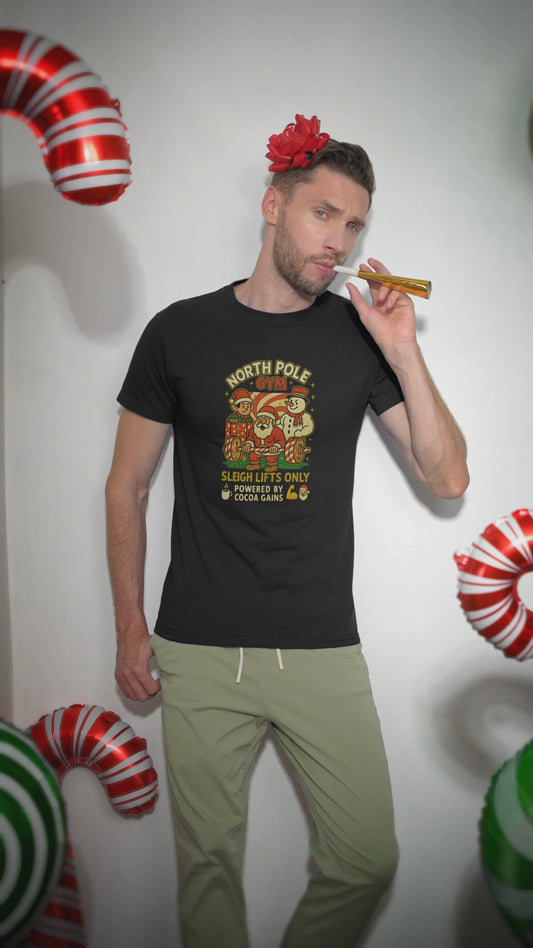 North Pole Gym Funny Christmas T-Shirt | Unisex Heavy Cotton Holiday Workout Tee | Gift for Fitness Lover